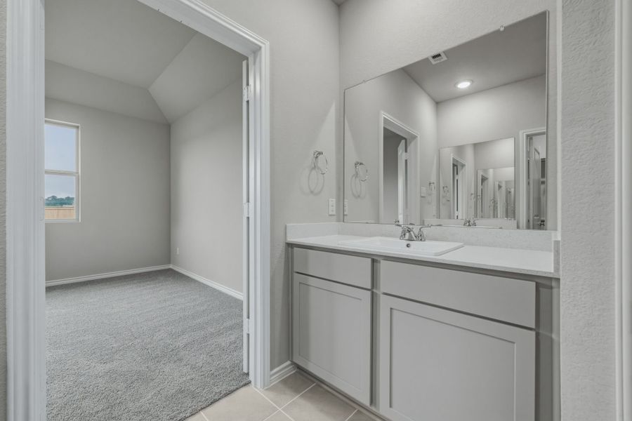 Primary Bathroom in the Cedar home plan by Trophy Signature Homes – REPRESENTATIVE PHOTO Primary Bathroom in the Cedar home plan by Trophy Signature Homes – REPRESENTATIVE PHOTO