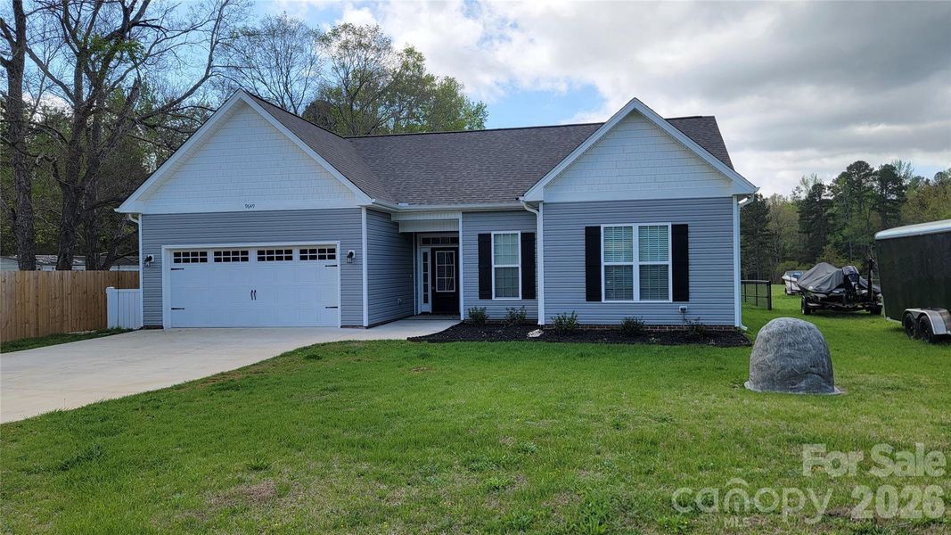 Front exterior of a new home in , Gold Hill, NC, highlighting curb appeal (Image 26).