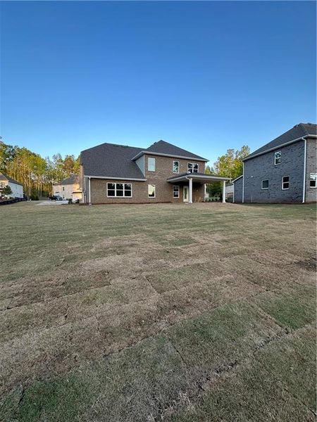 Exterior details and patio area of a home in Mirror Lake at South Harbour, Villa Rica (Image 29).