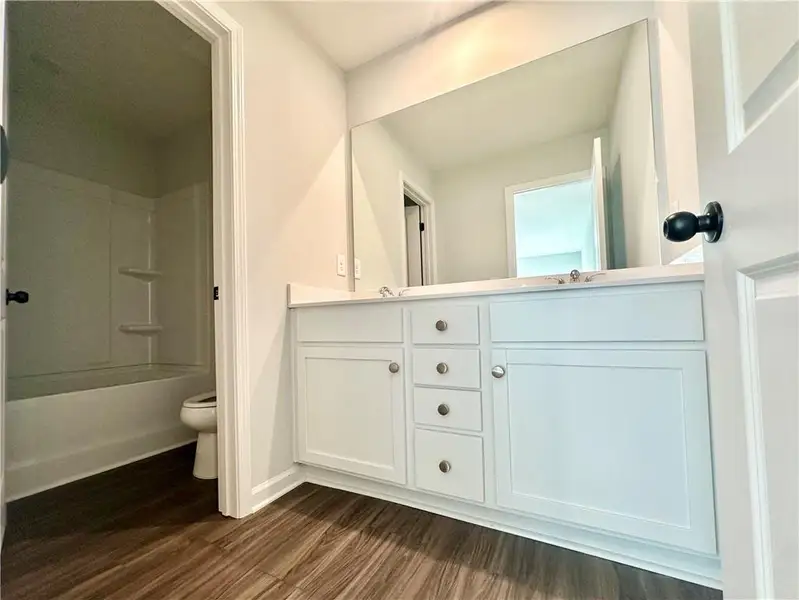 Furnished interior view inside a new home in Annsbury Park, Lilburn (Image 10).