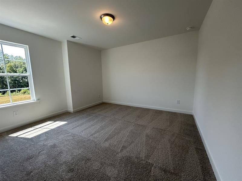 Spacious, unfurnished interior of a new home in Sutton's Landing, Statham (Image 12).