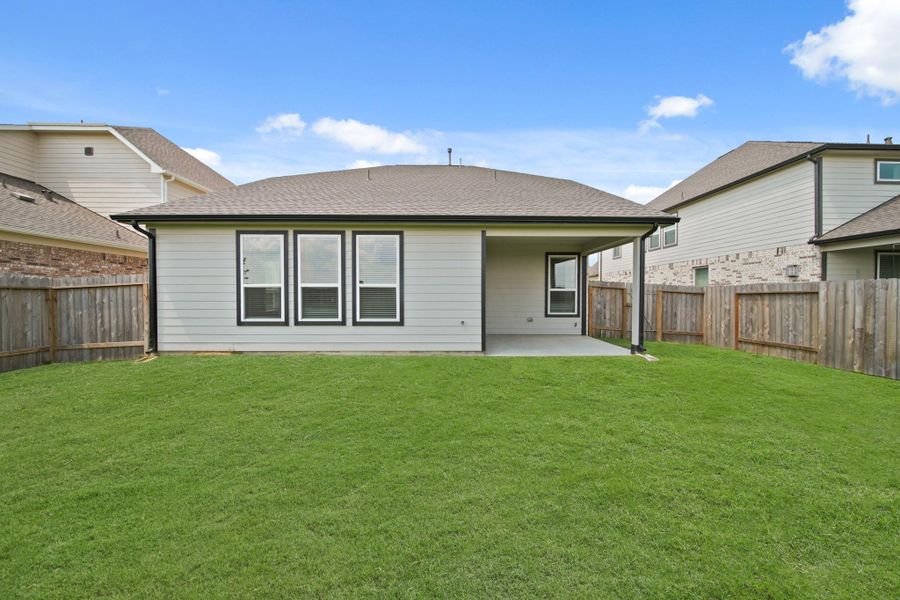 Front exterior of a new home in Beacon Hill, Waller, TX, highlighting curb appeal (Image 15).