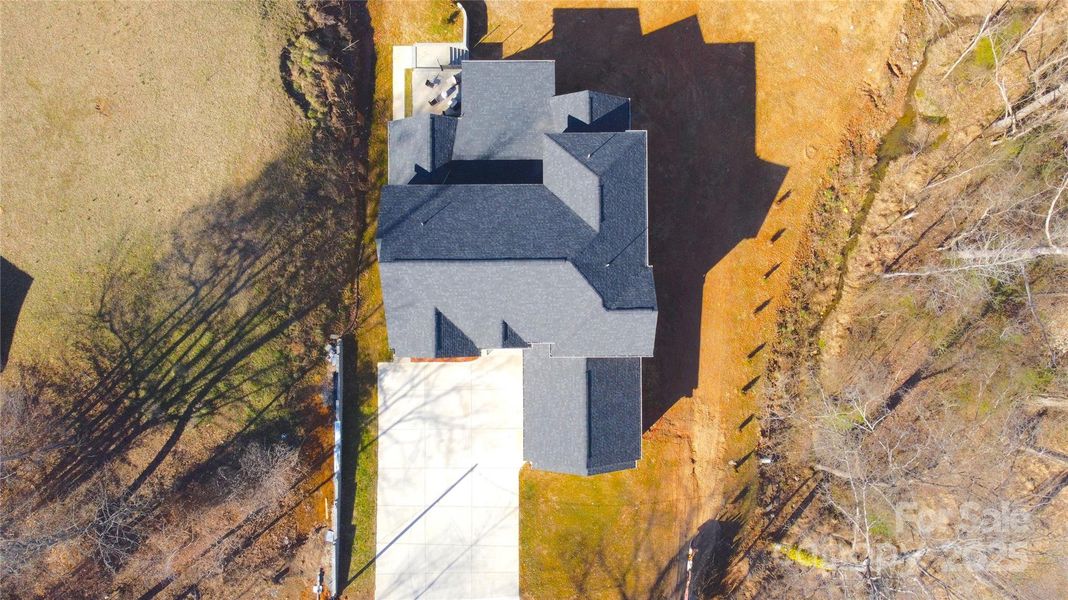 Front exterior of a new home in , Charlotte, NC, highlighting curb appeal (Image 12).
