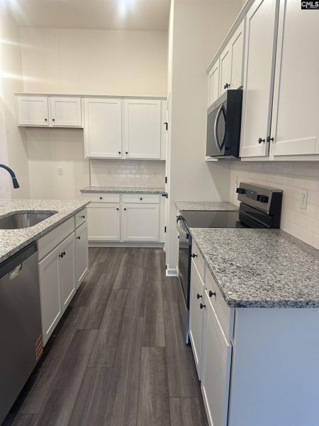 Furnished interior view inside a new home in Piney Woods Bluff, Columbia (Image 3).