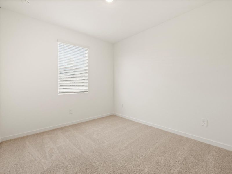 Spacious, unfurnished interior of a new home in Rancho Mirage Estate Series, Maricopa (Image 15).