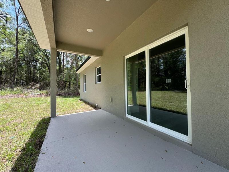 Exterior details and patio area of a home in , Citrus Springs (Image 23).