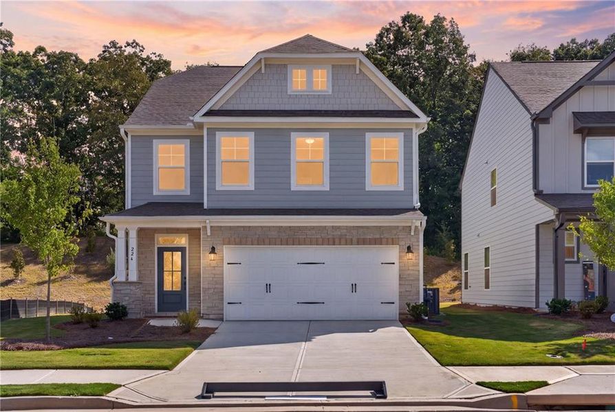 Front exterior of a new home in Villas at Dawsonville, Dawsonville, GA, highlighting curb appeal (Image 2). Front exterior of a new home in Villas at Dawsonville, Dawsonville, GA, highlighting curb appeal (Image 2).
