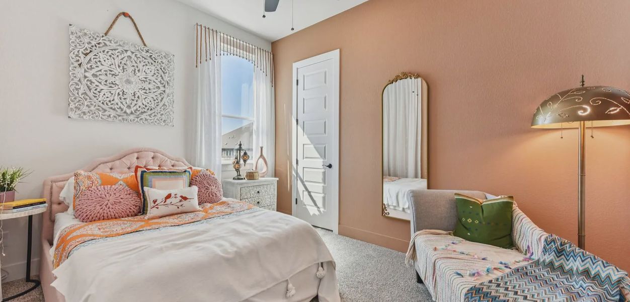 Representative furnished interior of a home built from the Silas by Chesmar Homes in The Grove at Blackhawk, Pflugerville (Image 9).