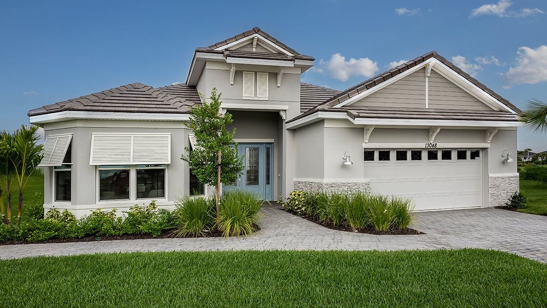 Representative exterior photo of a completed home built from the Pallazio by Taylor Morrison in Astor Creek Golf and Country Club, Port St. Lucie, FL (Image 24).