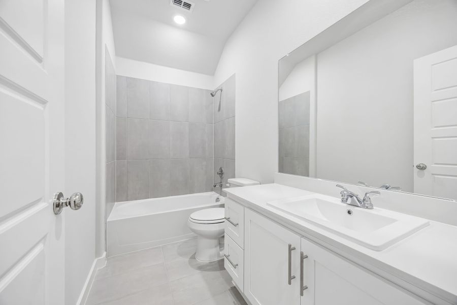 Secondary bathroom in the Heisman by Trophy Signature Homes – REPRESENTATIVE PHOTO Secondary bathroom in the Heisman by Trophy Signature Homes – REPRESENTATIVE PHOTO