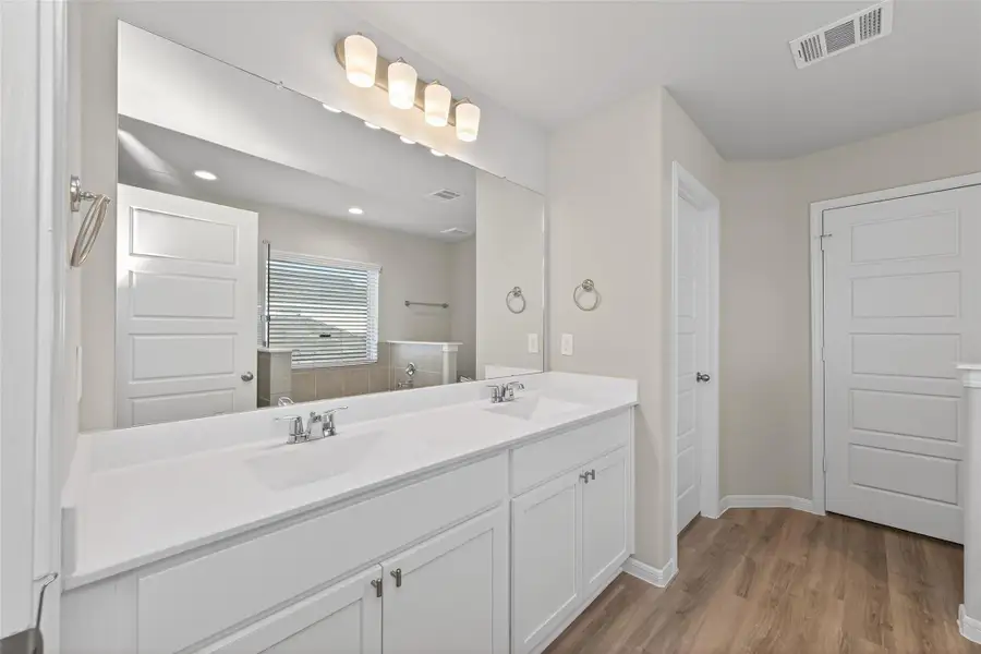 Furnished interior view inside a new home in Woodland Lakes, Houston (Image 12).