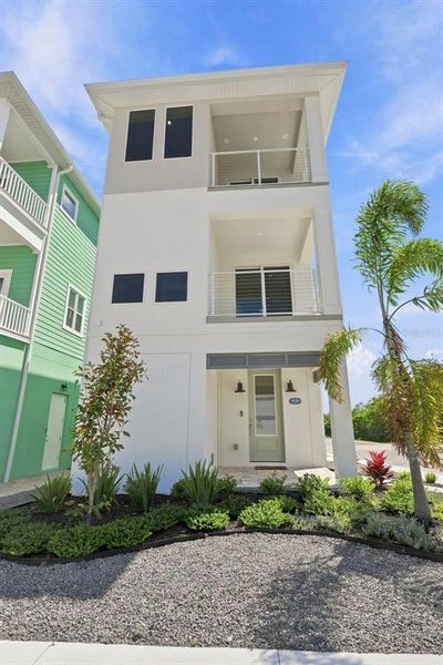 Front exterior of a new home in , Indian Rocks Beach, FL, highlighting curb appeal (Image 32). Front exterior of a new home in , Indian Rocks Beach, FL, highlighting curb appeal (Image 32).