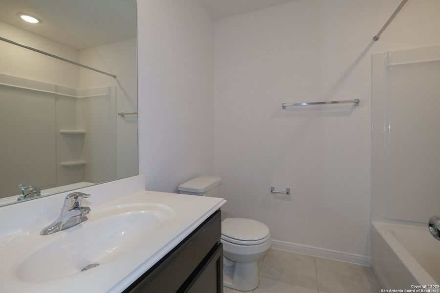 Furnished interior view inside a new home in Agave, San Antonio (Image 12).