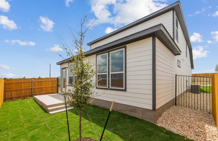 Exterior details and patio area of a home in Cameron Place, Manor (Image 18).