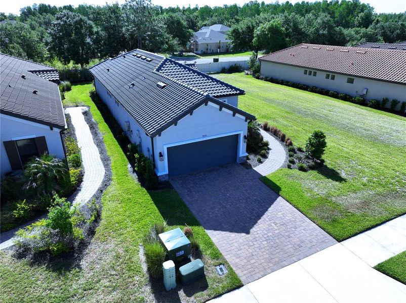 Front exterior of a new home in , Wesley Chapel, FL, highlighting curb appeal (Image 32).