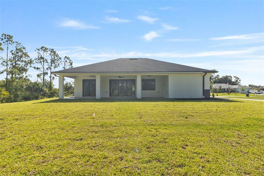 Exterior details and patio area of a home in , North Port (Image 25).