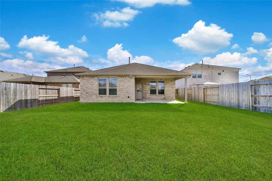 Exterior details and patio area of a home in , Cypress (Image 4).