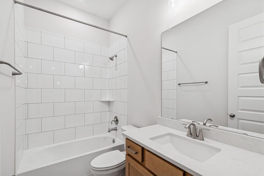 Furnished interior view inside a new home in The Highlands 40', Porter (Image 8). Furnished interior view inside a new home in The Highlands 40', Porter (Image 8).