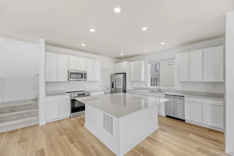 Furnished interior view inside a new home in Vermilion Creek, Centennial (Image 6).