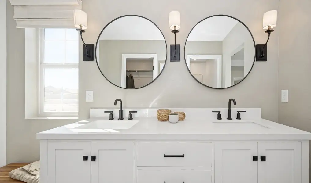 Freestanding vanity with matte black fixtures
