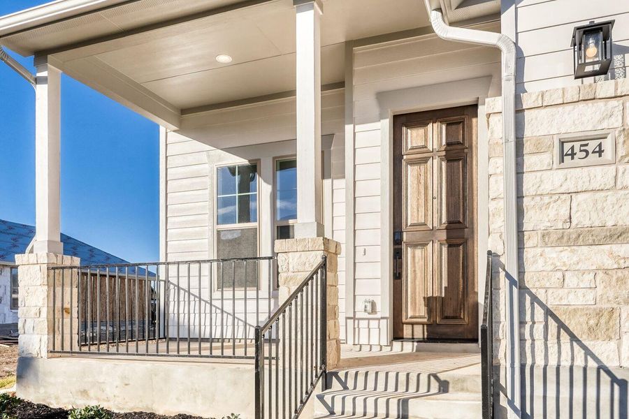 Exterior details and patio area of a home in The Porch at Du Pre, Buda (Image 3).