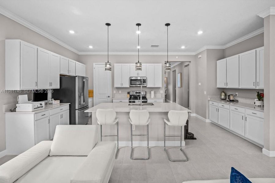 Furnished interior view inside a new home in Veranda Preserve, Port St. Lucie (Image 7).