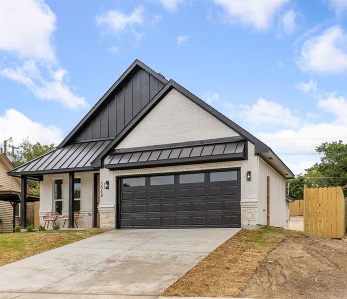 View of front of house with a garage