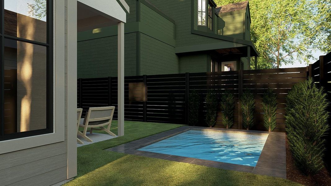 View of swimming pool and a covered patio.