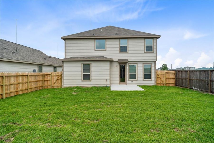 Come and see this spacious backyard! There is plenty of room for the kids to play and adults to relax! Perfect for your outdoor living space, patio furniture, bbq pit, and so much more. The possibilities are endless!