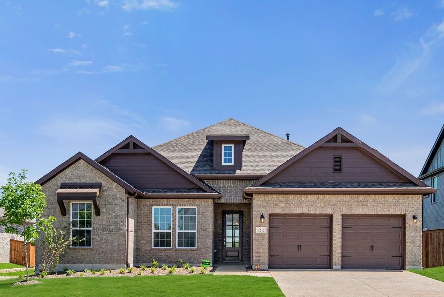 Front exterior of a home in the Edgewater community, located in Fate, TX (Image 10). Front exterior of a home in the Edgewater community, located in Fate, TX (Image 10).