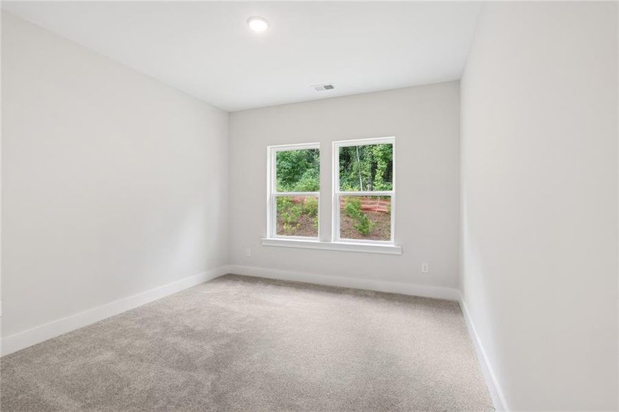 Spacious, unfurnished interior of a new home in Settingdown Farms, Cumming (Image 16).