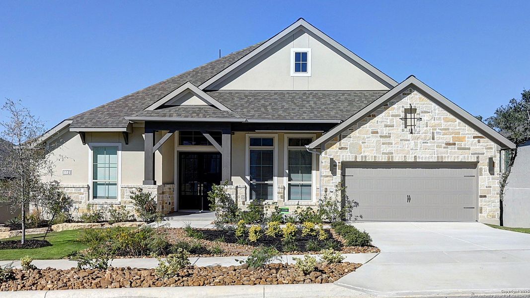 Front exterior of a new home in Esperanza 80', Boerne, TX, highlighting curb appeal (Image 1). Front exterior of a new home in Esperanza 80', Boerne, TX, highlighting curb appeal (Image 1).