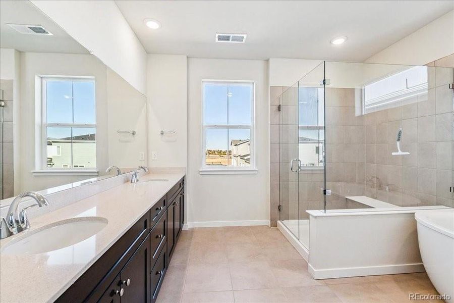 Furnished interior view inside a new home in Floret Collection at Alder Creek, Parker (Image 9).
