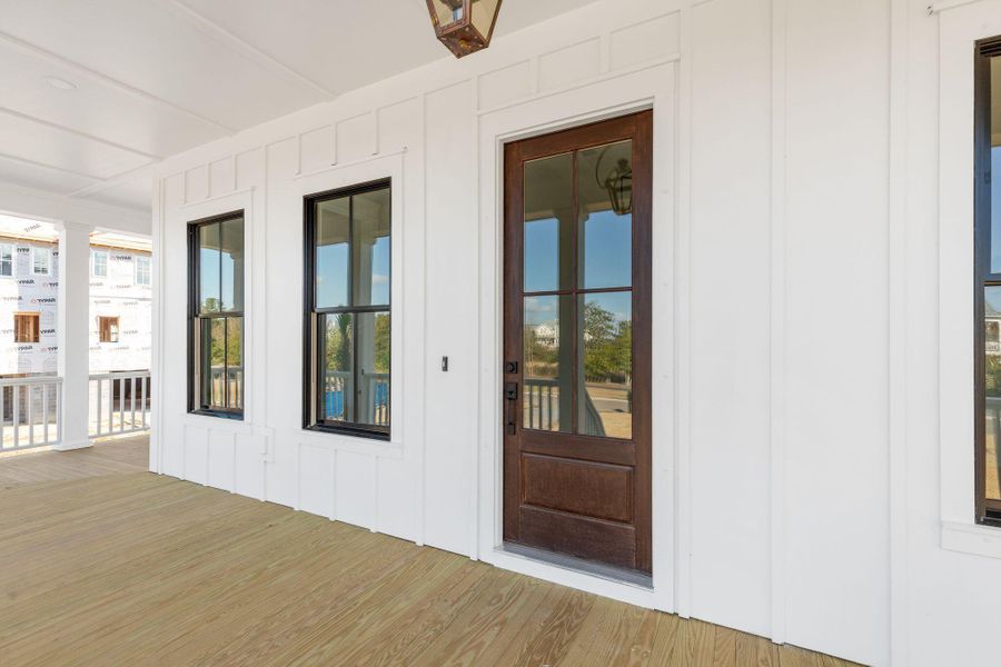 Exterior details and patio area of a home in Rivercroft, Awendaw (Image 34).