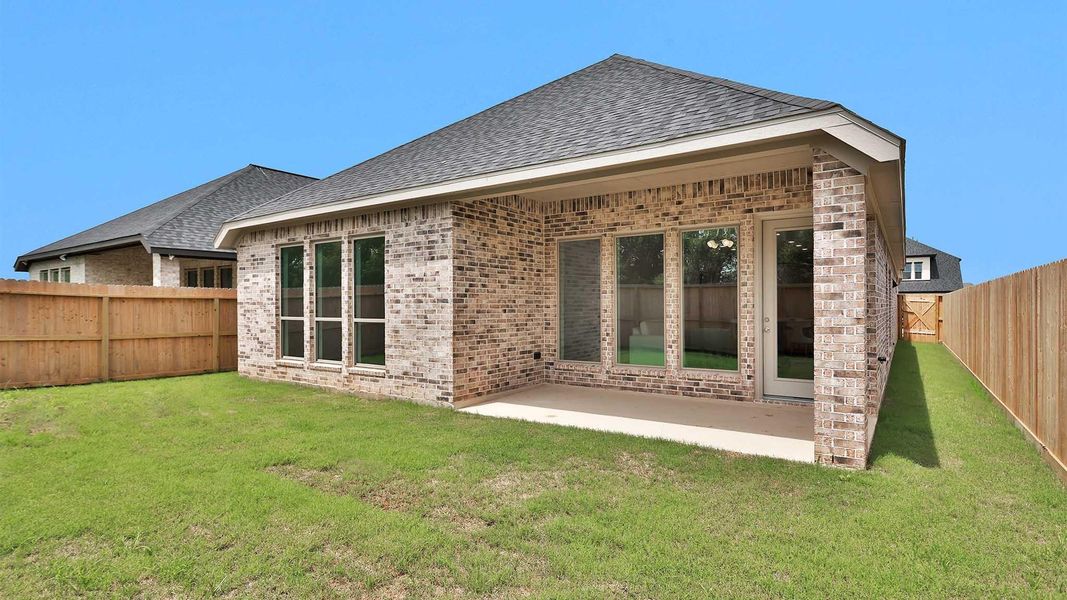 Exterior details and patio area of a home in Harvest Green, Richmond (Image 2).