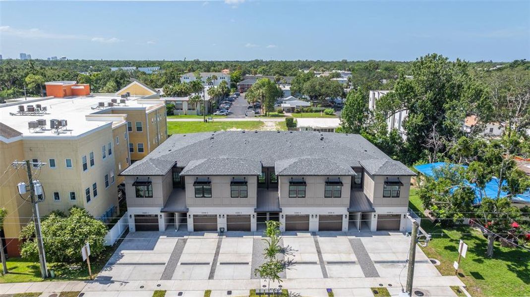 Front exterior of a new home in , Tampa, FL, highlighting curb appeal (Image 25).