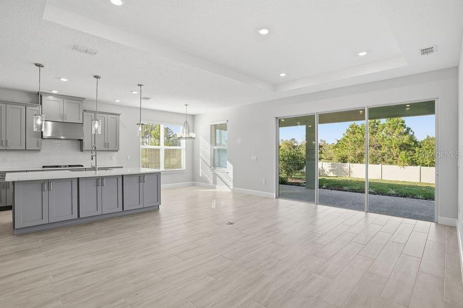 Spacious, unfurnished interior of a new home in Esplanade at Center Lake Ranch, St. Cloud (Image 28).
