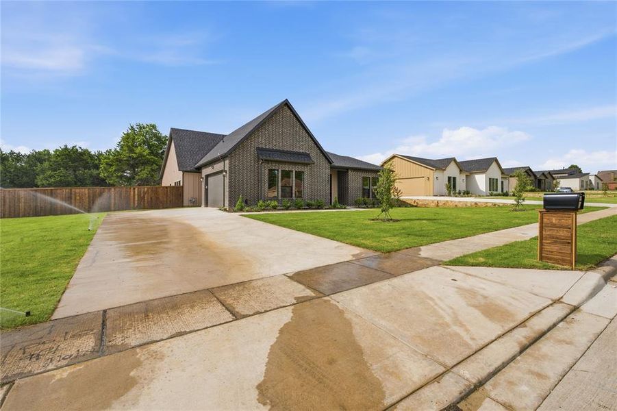 Front exterior of a new home in , Dallas, TX, highlighting curb appeal (Image 20).