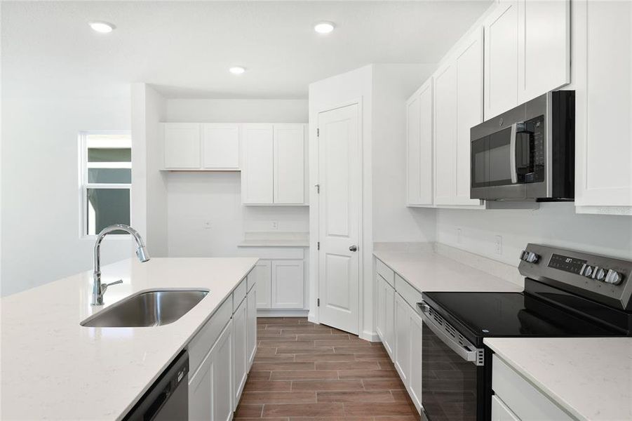 Furnished interior view inside a new home in Seasons at Shores of Lake Dell, Dundee (Image 7).
