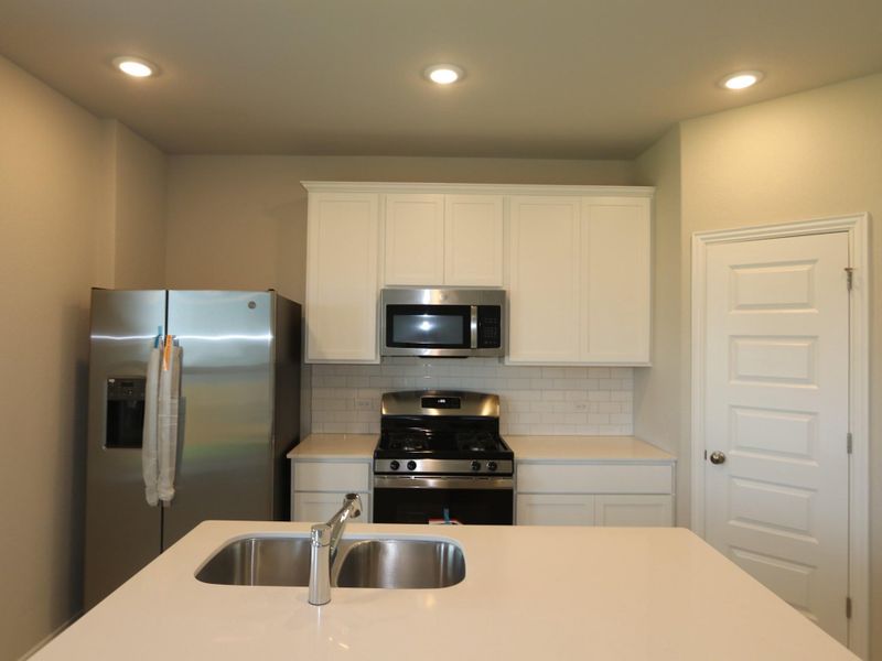 Furnished interior view inside a new home in Cascades at Onion Creek, Austin (Image 8). Furnished interior view inside a new home in Cascades at Onion Creek, Austin (Image 8).