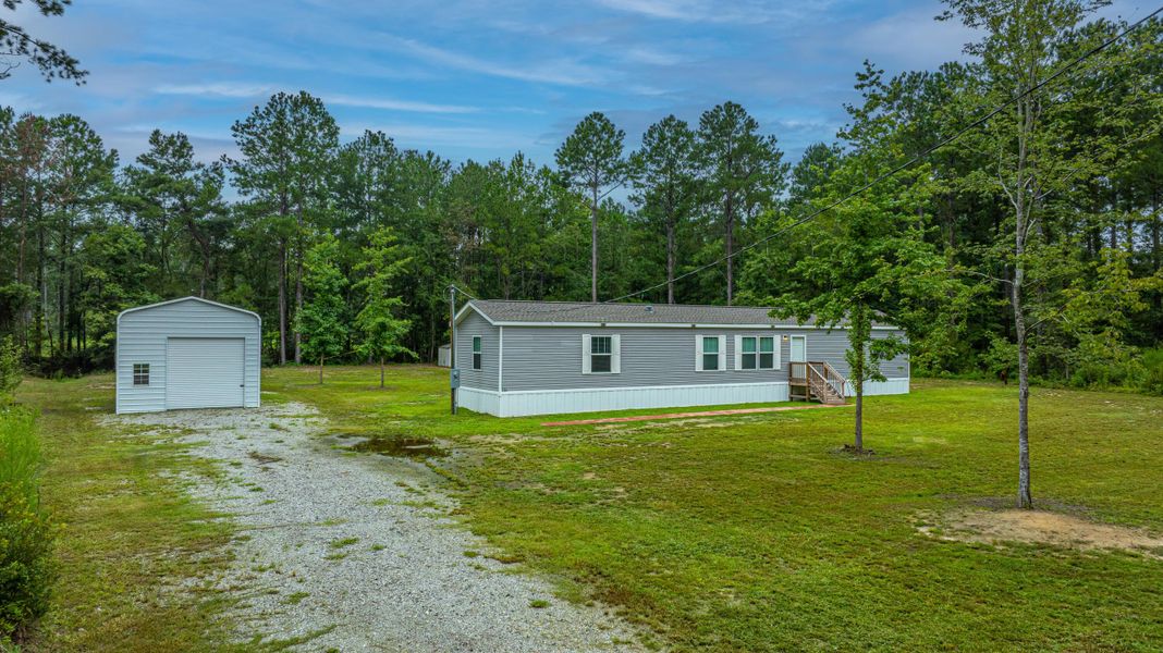 Front exterior of a new home in , Eutawville, SC, highlighting curb appeal (Image 28). Front exterior of a new home in , Eutawville, SC, highlighting curb appeal (Image 28).