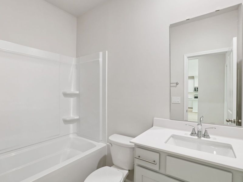 Furnished interior view inside a new home in River Glen, Angier (Image 6).