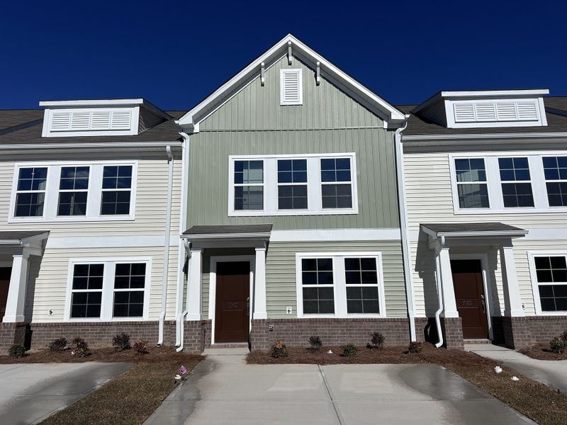 Front exterior of a new home in Astoria, Columbia, SC, highlighting curb appeal (Image 1).