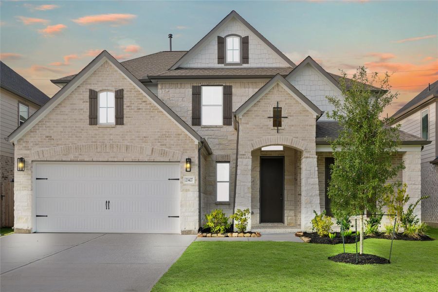 Front exterior of a new home in Morton Creek Ranch, Katy, TX, highlighting curb appeal (Image 1). Front exterior of a new home in Morton Creek Ranch, Katy, TX, highlighting curb appeal (Image 1).