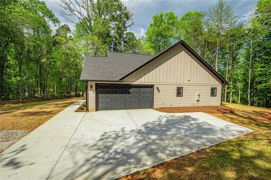 Front exterior of a new home in , Dawsonville, GA, highlighting curb appeal (Image 28).