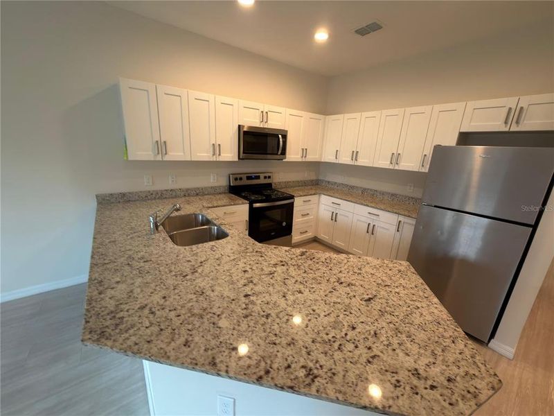 Furnished interior view inside a new home in , Kissimmee (Image 5). Furnished interior view inside a new home in , Kissimmee (Image 5).