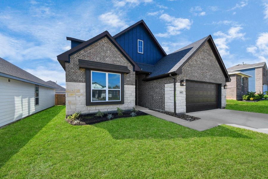 Front exterior of a new home in Lexington Heights, Willis, TX, highlighting curb appeal (Image 24).