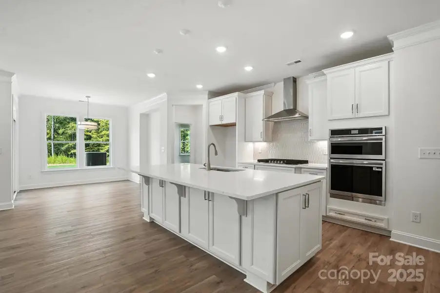 Furnished interior view inside a new home in Heritage - 55+ Community, Indian Trail (Image 3).