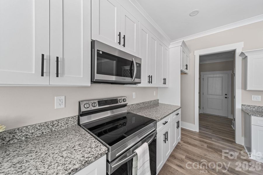 Furnished interior view inside a new home in , Matthews (Image 8).
