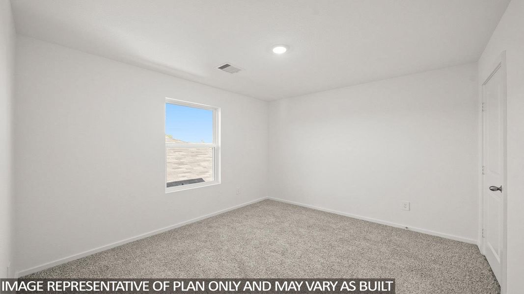 Empty room with light carpet and baseboards